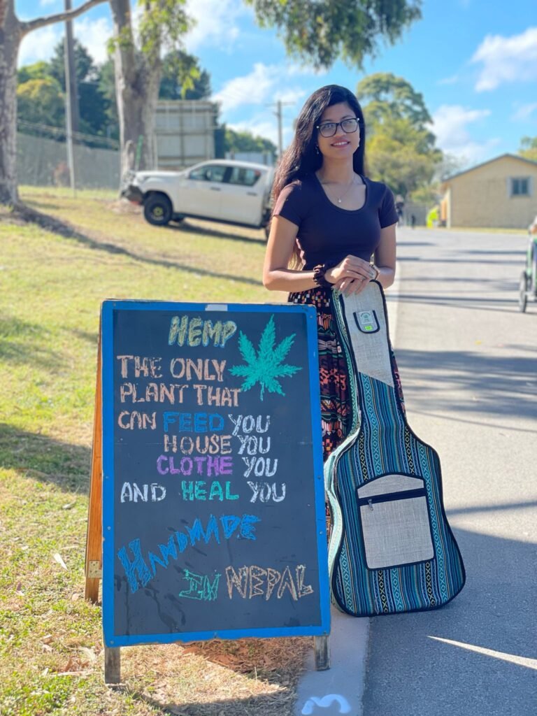 Model with a display board and a hemp guitar cover