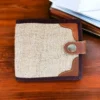 Earthy brown color hemp wallet with a button closure and various compartments inside