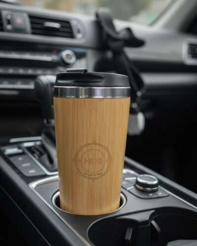 bamboo tumbler placed in a car cup holder