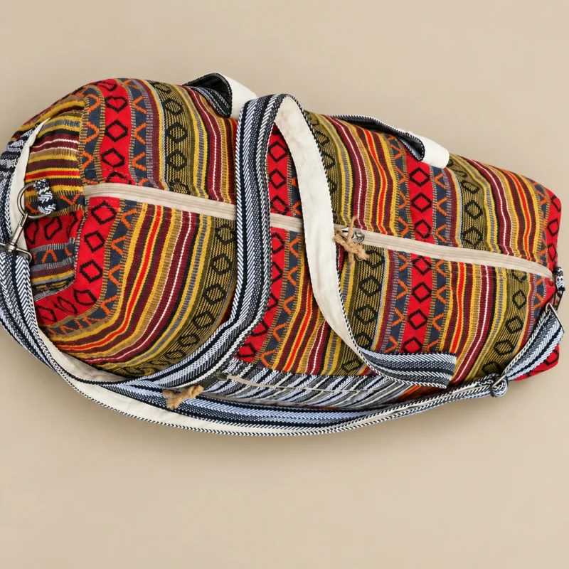 Close-up of Colorful and Vibrant Duffle Bag showing woven textile texture, side pocket and strap hardware