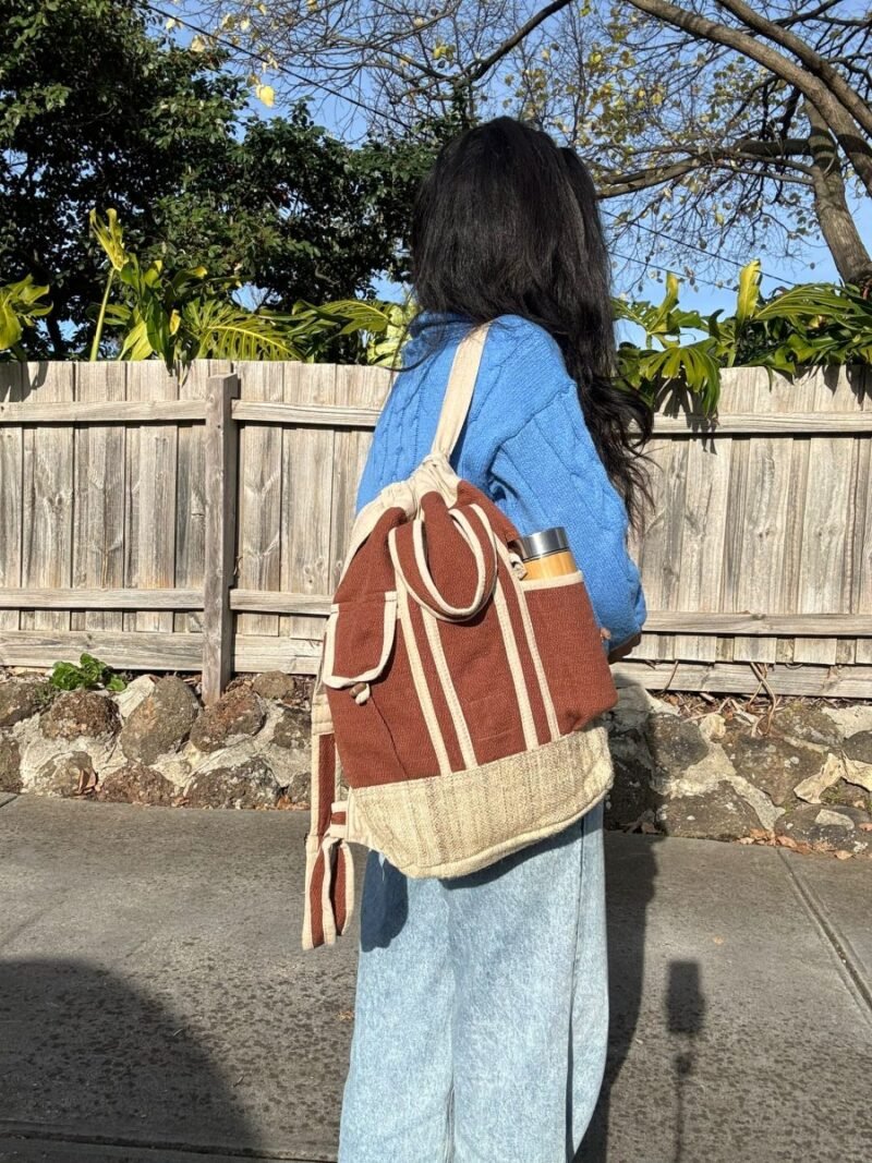 Women carrying Brown TerraTrek hemp backpack