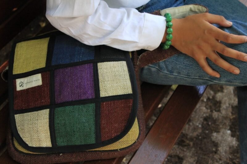 close up view of vibrant hemp side bag by spread Maya