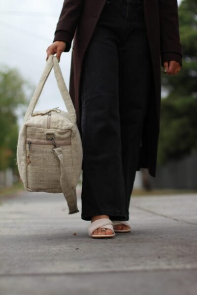 natural Duffle bag from side carry