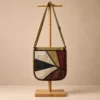 Brown vibrant hemp side bag handmade in Nepal – front view