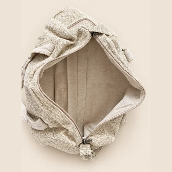 open natural hemp duffle bag showing the fabric lining and main compartment