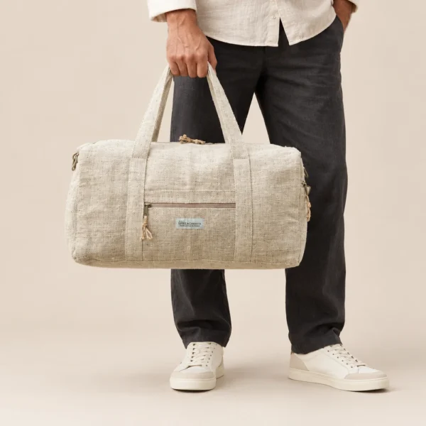 man holding a natural hemp duffle bag by its carry handles