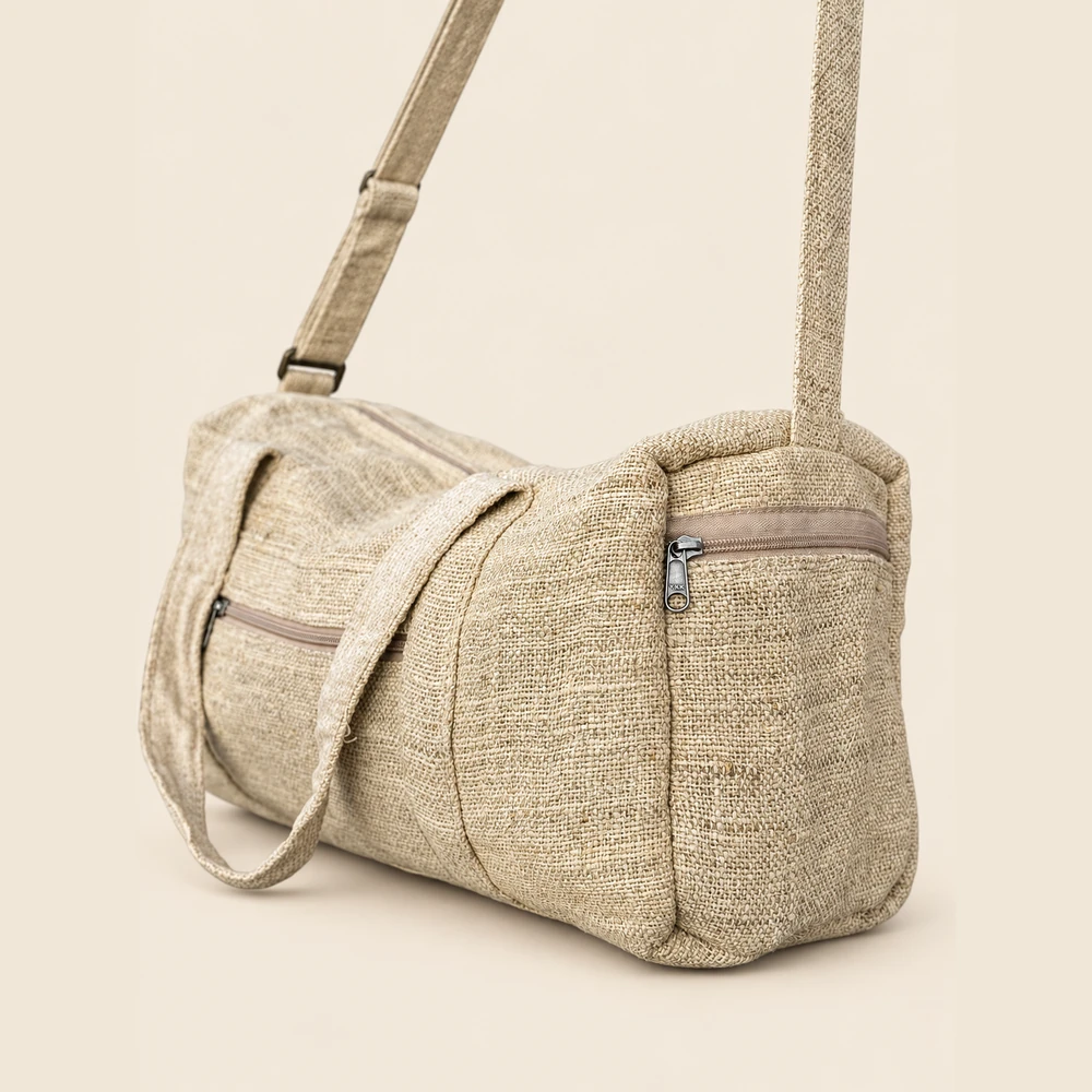Natural hemp duffe bag bag showing its zipped end pocket and woven texture