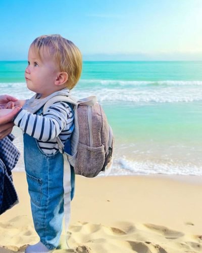 toddler with rose mini hemp backpack