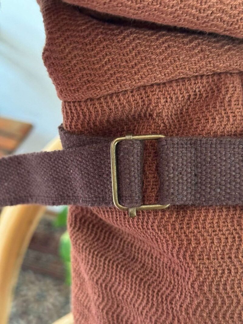 adjustable buckle of brown roll top hemp backapck