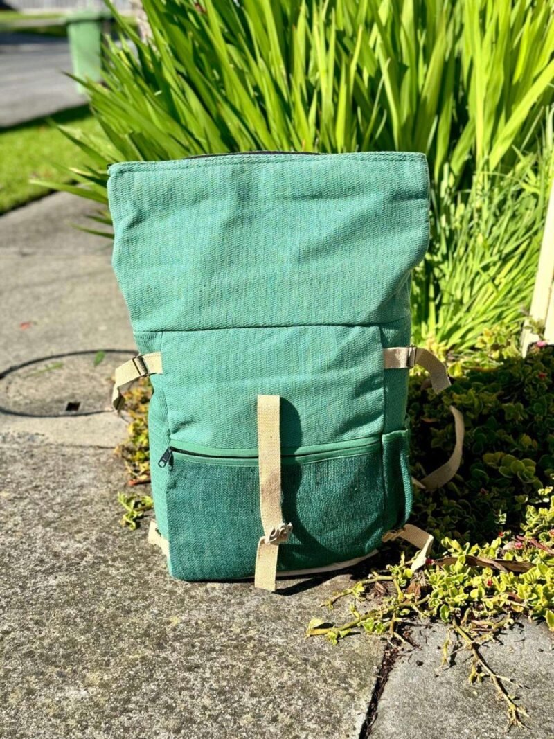 opened green color roll top hemp backpack