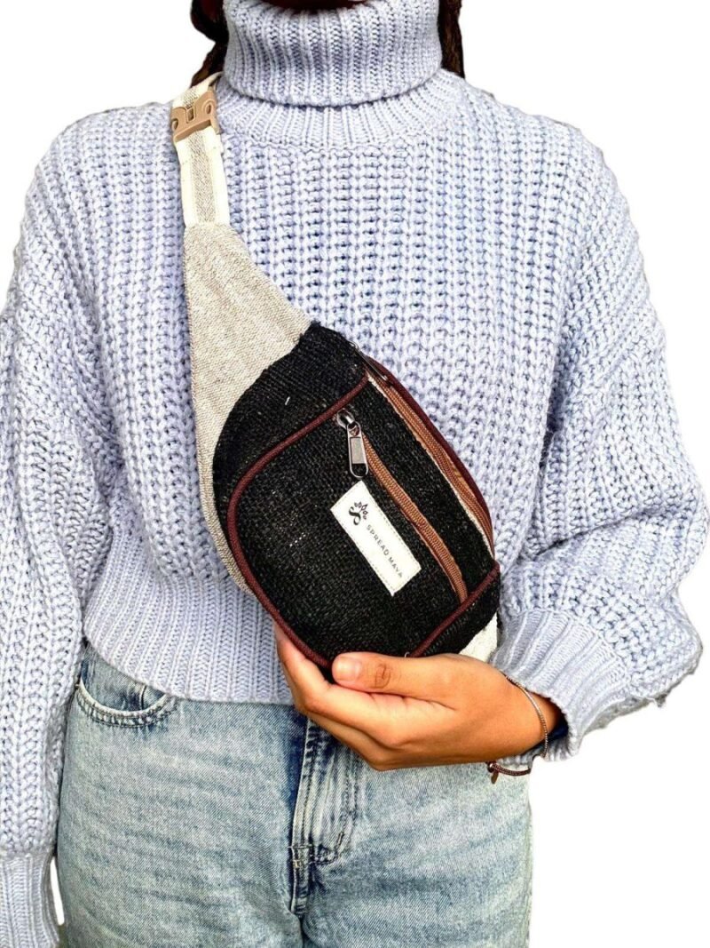 women carrying black hemp bum bag as a crossbody