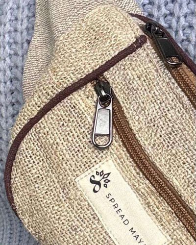 zoomed view of beige fanny pack