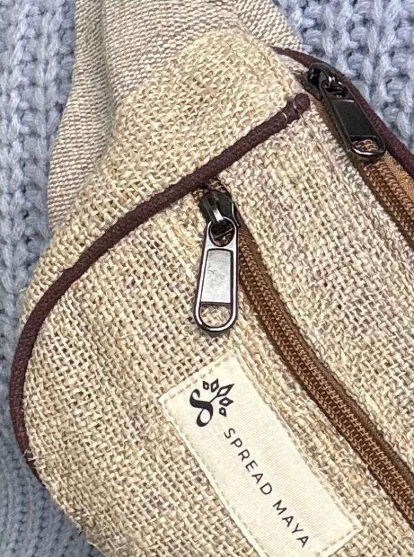 zoomed view of beige fanny pack