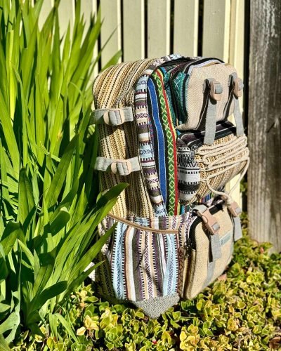 large hemp travel bag with raincover side view