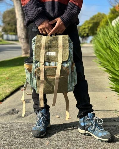 man carrying green hemp urban backpack