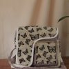 butterfly print hemp side bag on a table