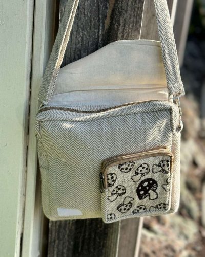 mushroom printed on small pocket of hemp side bag