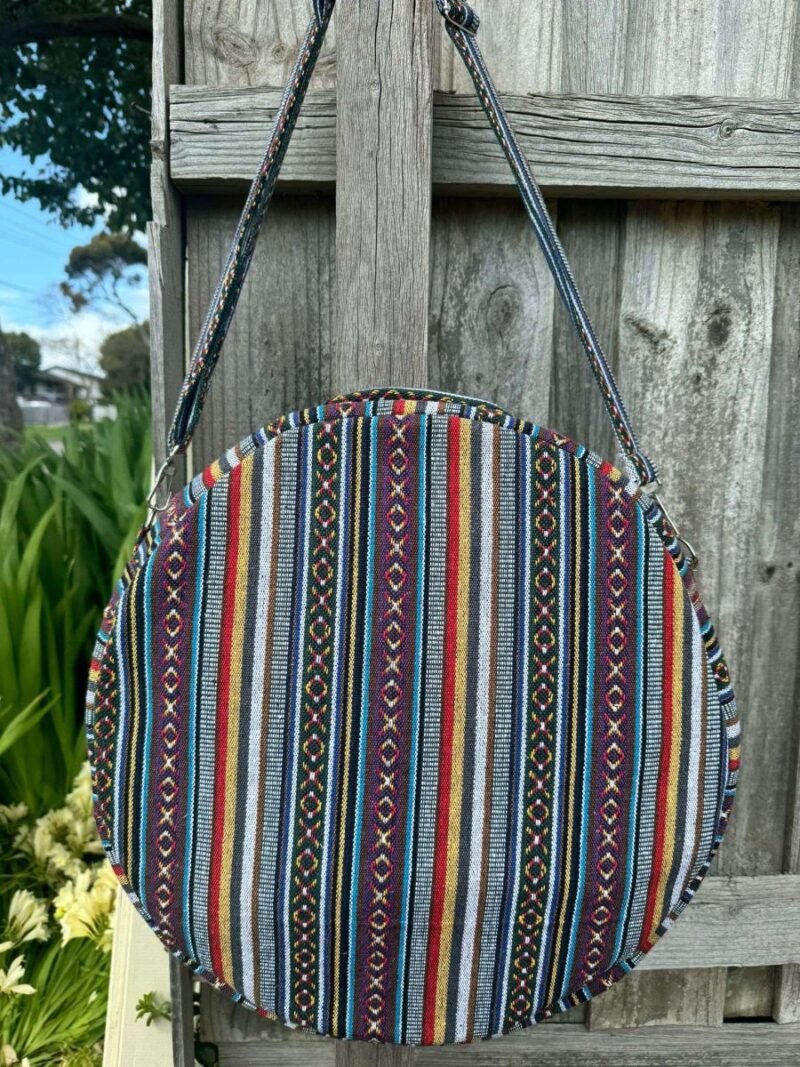 back view of blue patterned shamanic drum bag