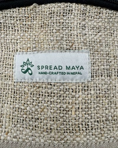 logo of spread maya stitched in a bag