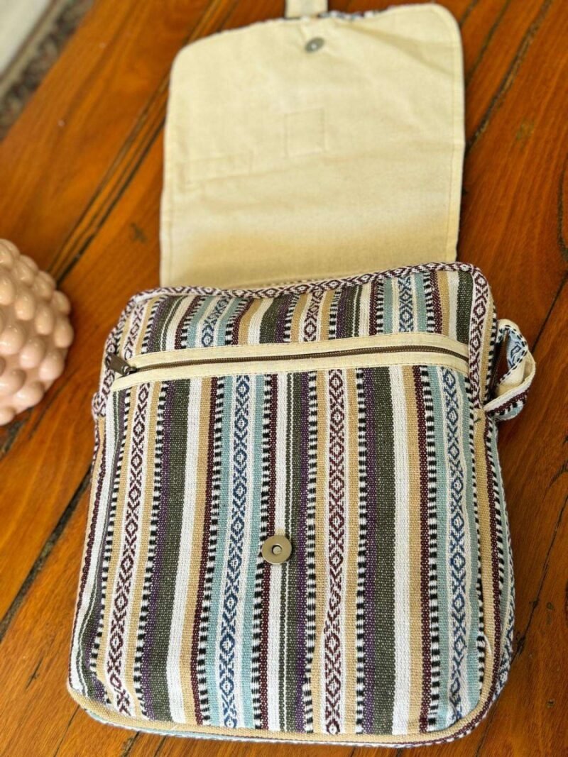 opened flap of white mix hemp side bag