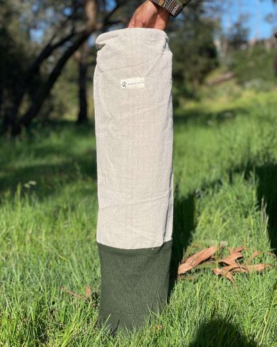 half green yoga mat cover on ground