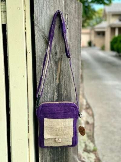 purple side bag hanging