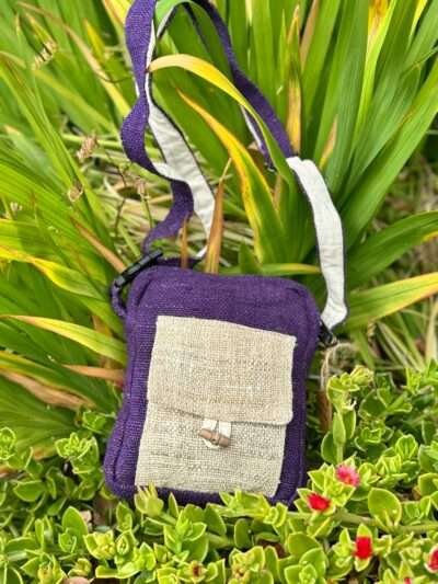 purple side bag on grass