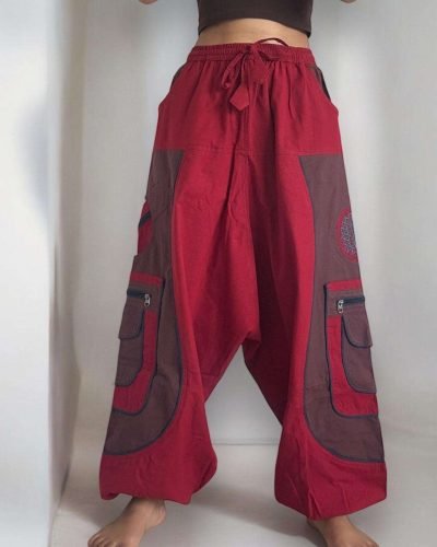 model wearing a Cherry red baggy cotton trouser, Hand-stitched in Nepal