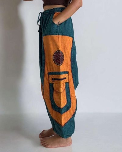 model wearing a Teal baggy cotton trouser, Hand-stitched in Nepal