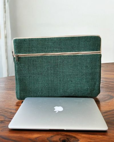 front view of green hemp laptop sleeve with a macbook