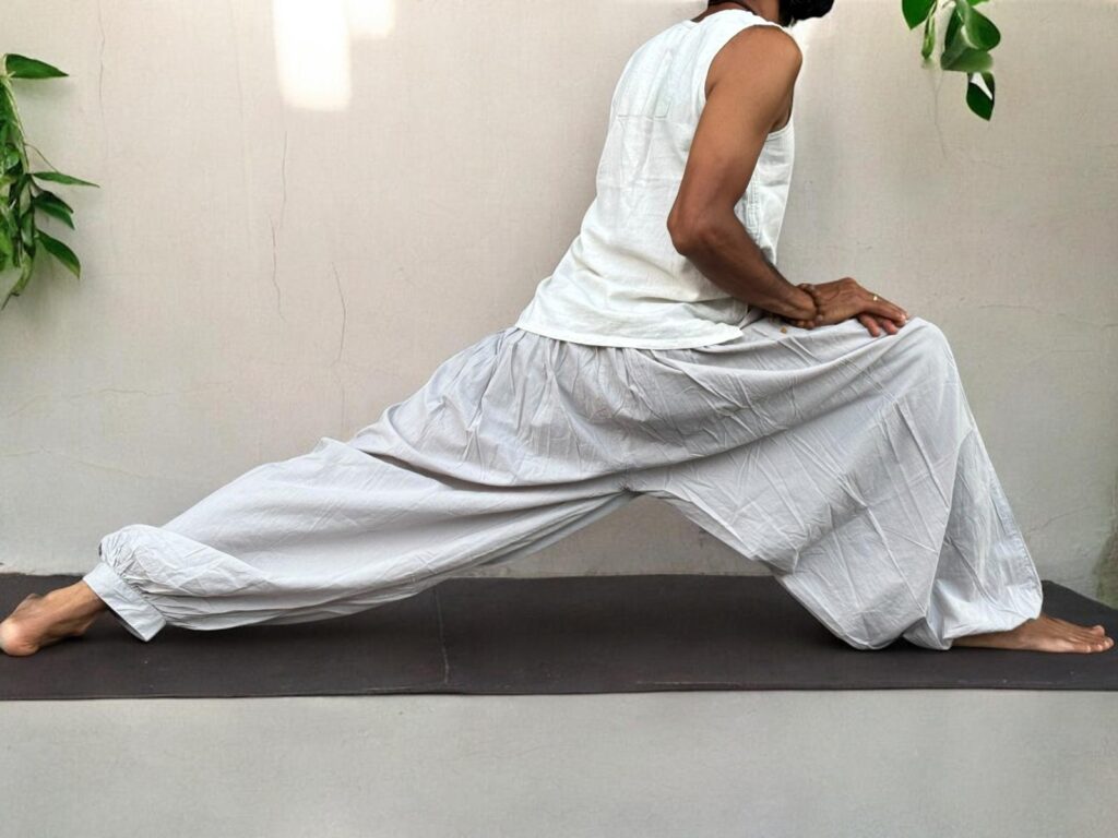 a man stretching in a cool breeze trouser