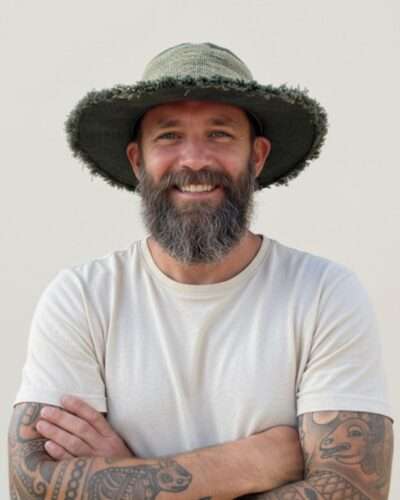 A man wearing green wide brim sun hats for men by spread maya