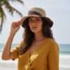 A woman posing with handmade crochet hemp hat in natural setting