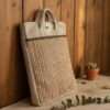 hemp cotton laptop sleeve against a wall