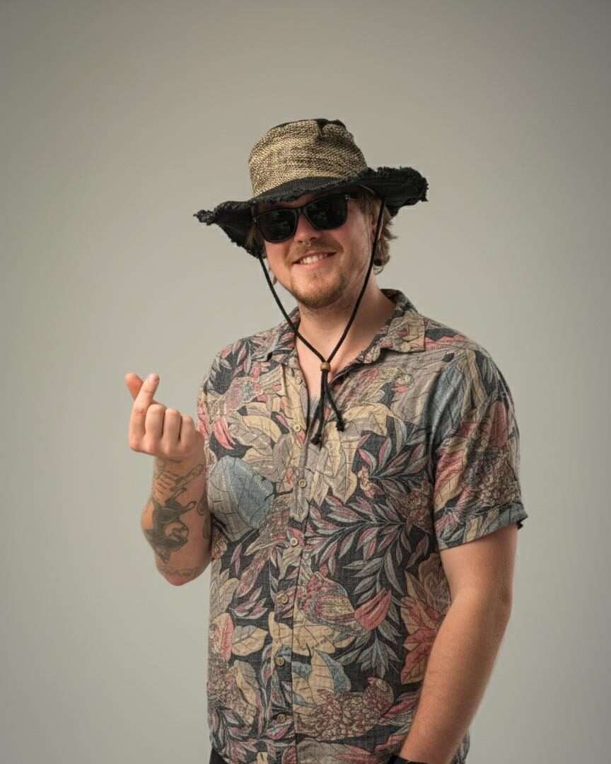a man posing with hemp cruiser hemp hat with string