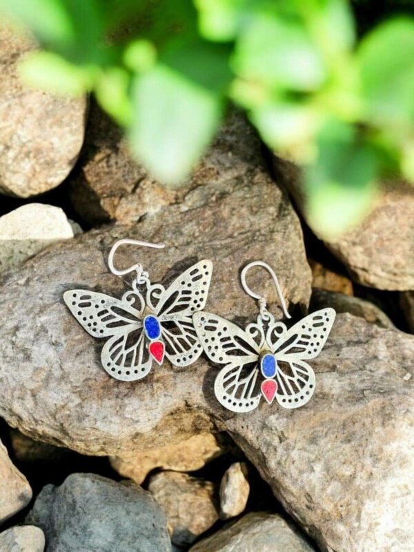silver butterfly earring with red and blue color