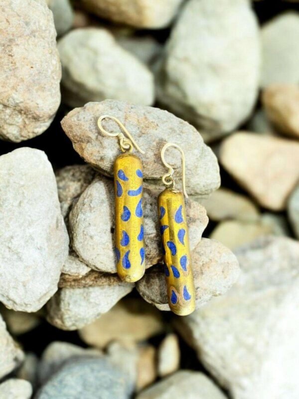 cylindrical yellow and blue print