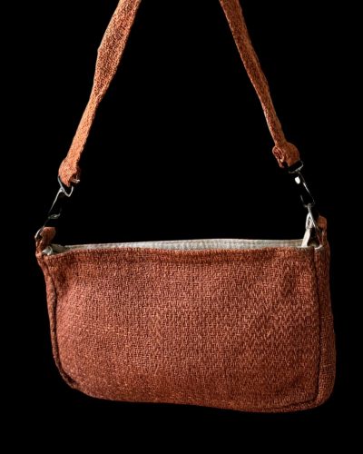 brown hand carry bag