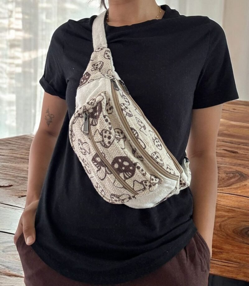 women carrying mushroom printed hemp side bag across shoulder