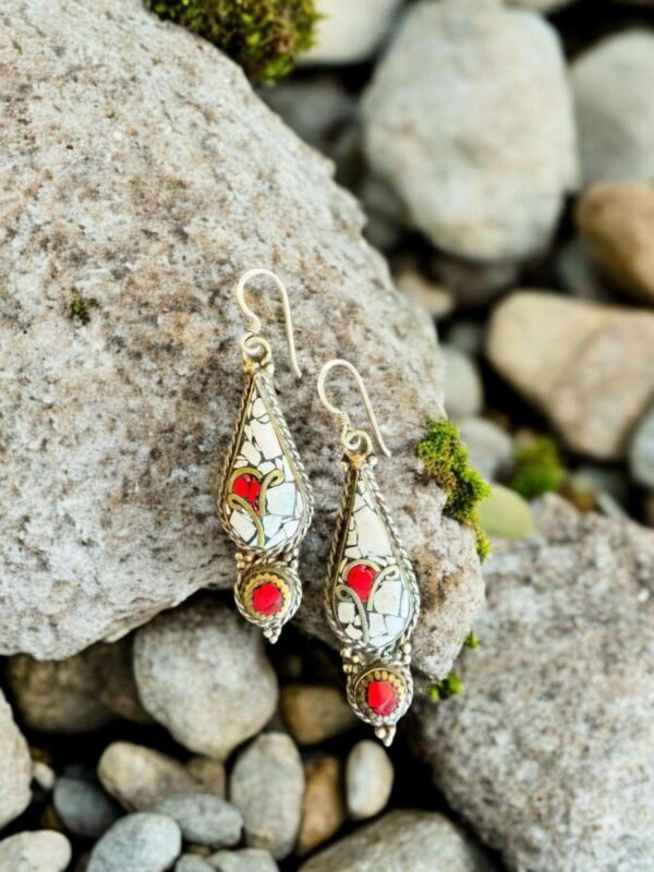 red and pinkish earring