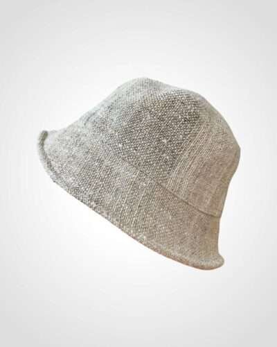 beige hemp bucket hat in plain background