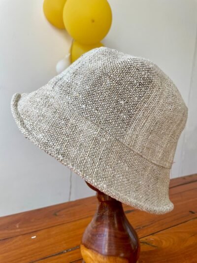 Beige hemp hat on stand