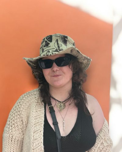 a women wearing mushroom printed hemp hat