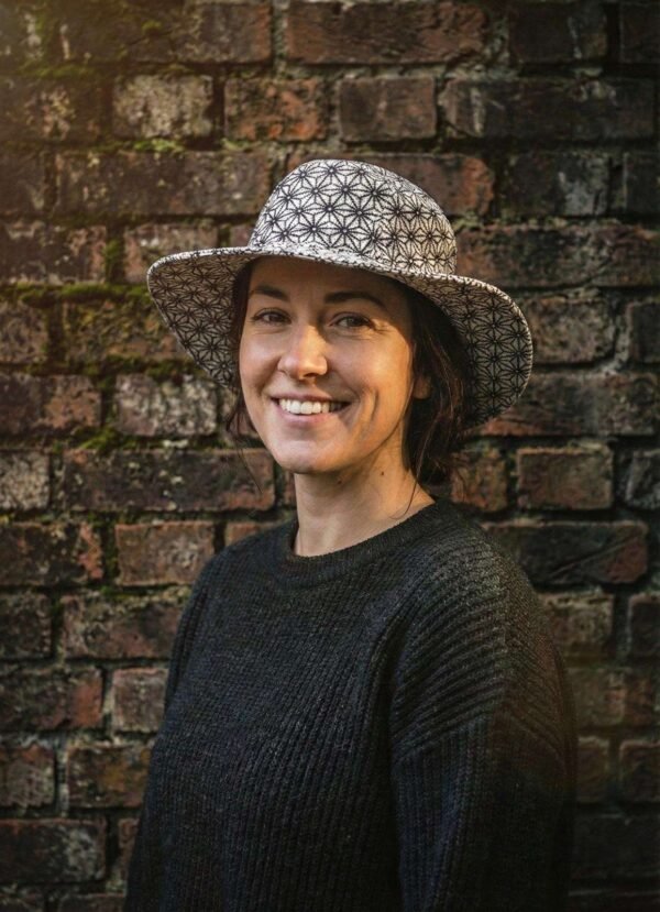 a woman wearing cobweb hemp hat