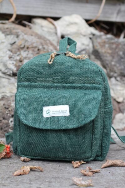 Hempster Green Mini Backpack front on the ground