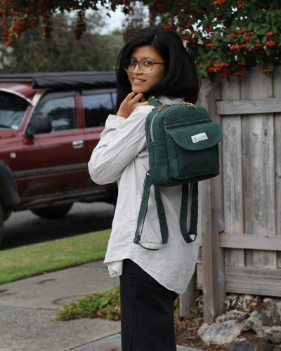 Hempster Green Mini Backpack carrying by a woman