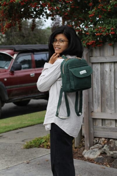 Hempster Green Mini Backpack carrying by a woman