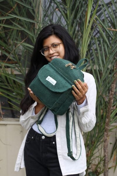 Hempster Green Mini Backpack carrying by a woman