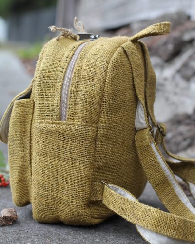 Hempster mini backpack side on the ground