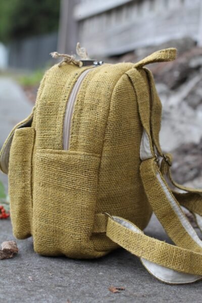Hempster mini backpack side on the ground